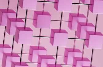 a bunch of pink cubes hanging from a pink wall